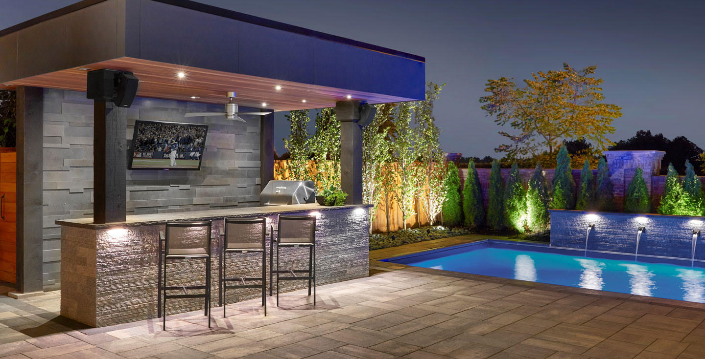 How to Turn a Corner of Your Backyard into a Proper Outdoor Kitchen